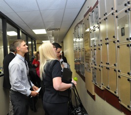 Scholarship recipients and donors looking at the new donor wall