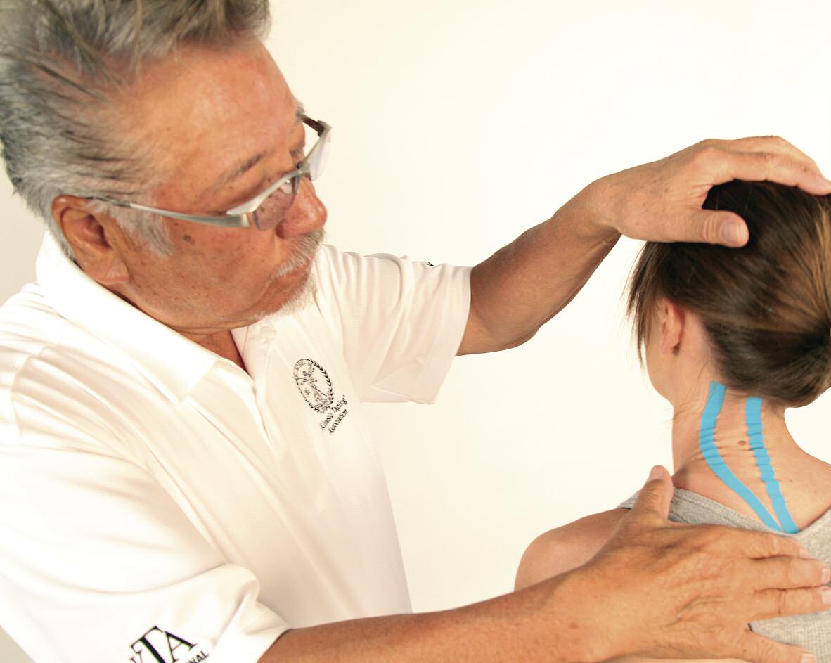 Kenzo Kase, DC, demonstrates a typical taping technique.
