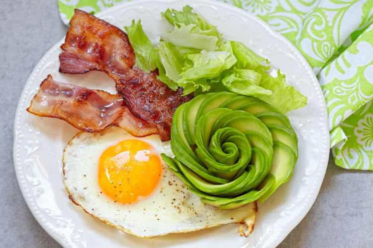 A keto diet is similar to the introductory phase of the Atkins diet in that it is extremely low in carbohydrates and high in fat. By depriving the body of carbs, it starts breaking fat down into chemical substances called ketones and ketoacids, thus the term “ketogenic.”