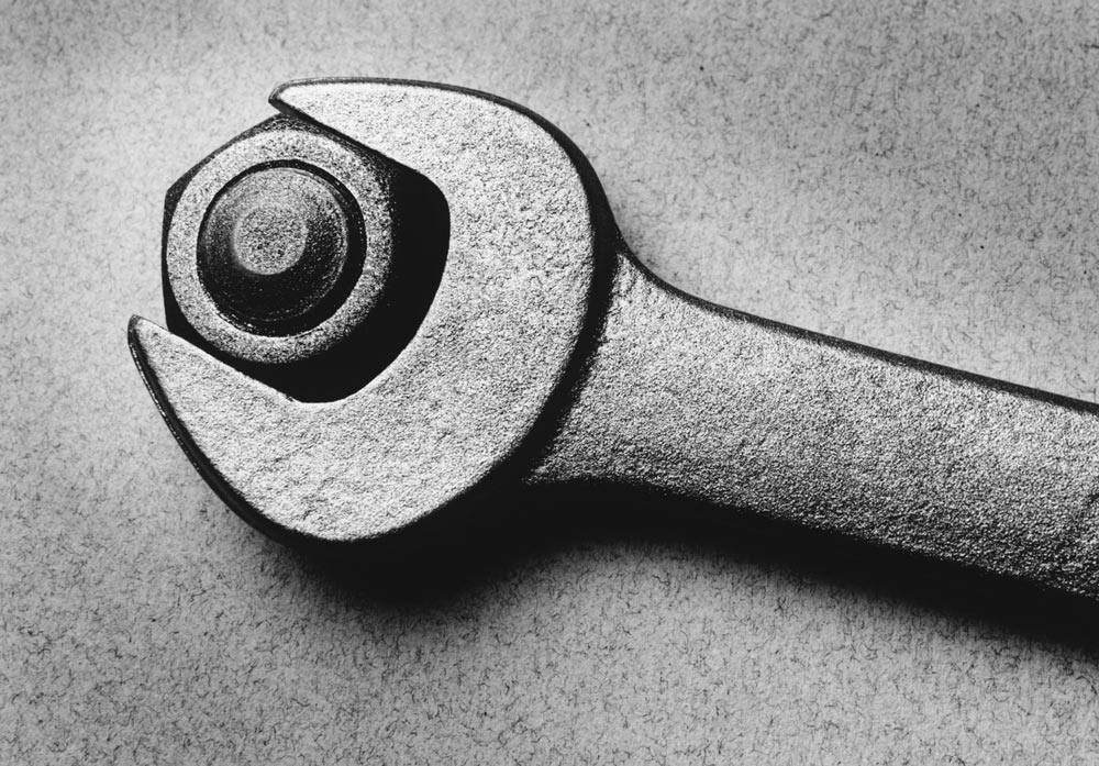 wrench turning bolt